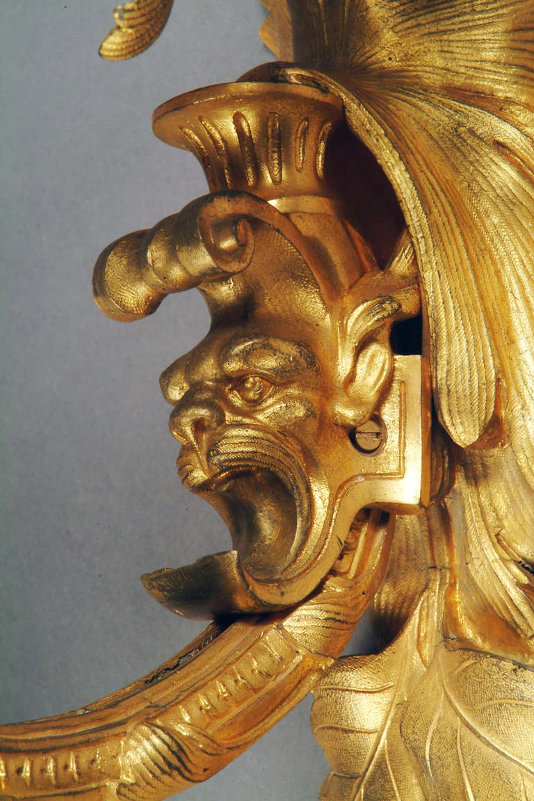 A Pair of French Louis XV style Gilt-Bronze 5-light Wall Sconces with Lion Heads 1