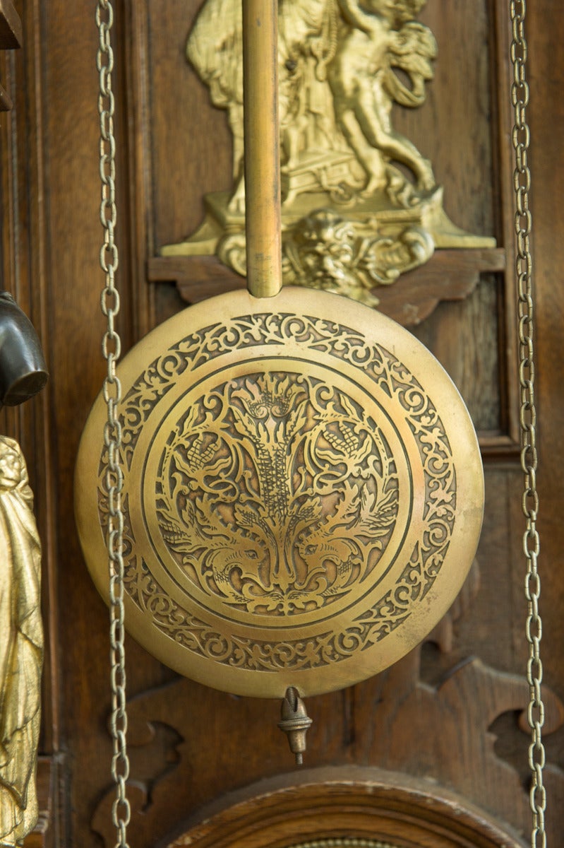 A Fine Austrian Antique Patinated and Ormolu-Mounted Oak grandfather clock In Excellent Condition In Los Angeles, CA