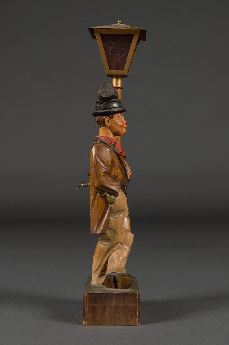 A vintage German Karl Griesbaum automation wood carved whistler and lamp,

Germany, circa 1930. 

Dimensions: Height: 19
