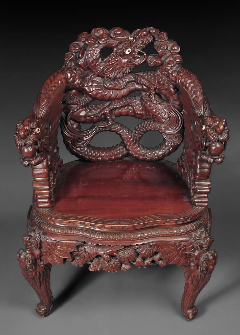 A Japanese Export Carved Rosewood Armchair with Dragon Handles

Circa 1920

Origin: Japan

Height: 38