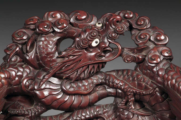 A Japanese Export Carved Rosewood Armchair with Dragon Handles In Excellent Condition In Los Angeles, CA