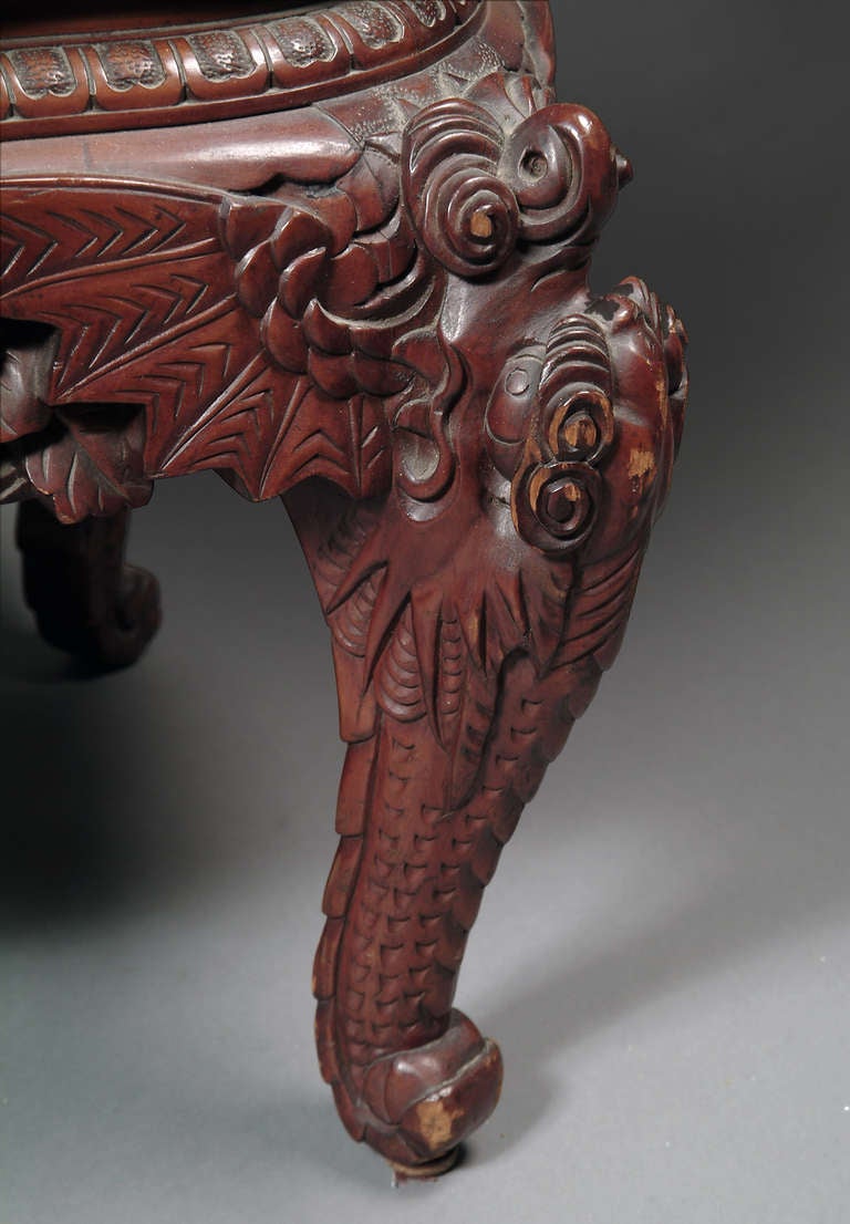 Early 20th Century A Japanese Export Carved Rosewood Armchair with Dragon Handles
