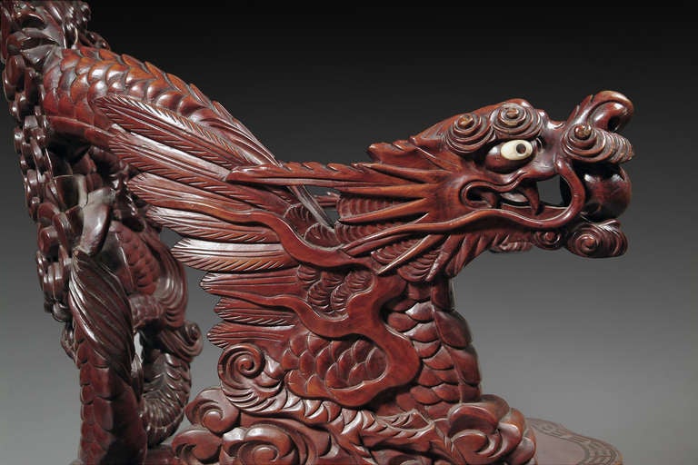 A Japanese Export Carved Rosewood Armchair with Dragon Handles 1