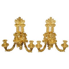 A Pair of French Antique Gilt Bronze Three-Light Wall Sconces With Figural Heads