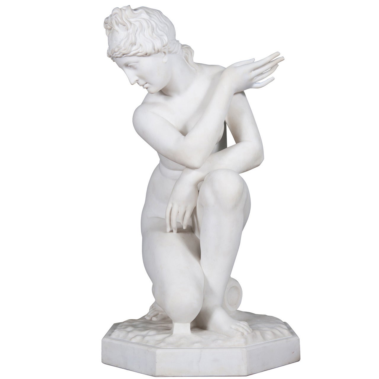 A large and impressive 19th century Italian hand carved white Carrara marble figure of the crouching Venus with octagonal base, set on a 19th century green marble circular pedestal fitted with octagonal top,

circa 1870

Measures: Height 70