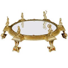 An Italian Gilt Bronze & Jeweled Figural Mirrored Plateau.