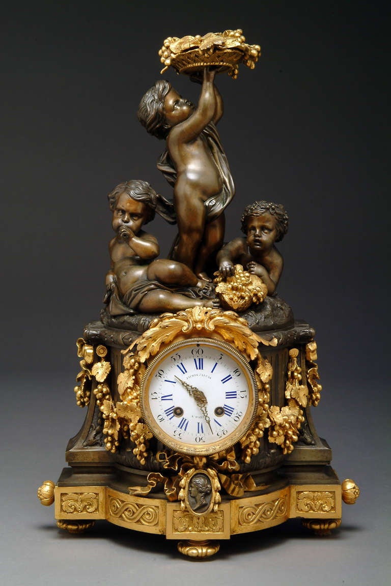 Very fine 19th century French gilt-bronze figural mantel clock by Raingo Freres, Retailed by Jacobs & Lucas. 
The movement stamped: Raingo Freres Paris.
The dial inscribed: Jacobas & Lucas A Paris. 

Raingo Freres began business in the early