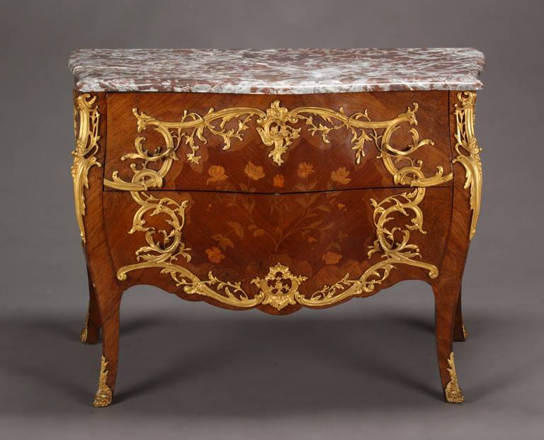A 19th Century French Louis XV Style Gilt Bronze Mounted and Marquetry Commode

Circa 1880

Country: France

Height 32