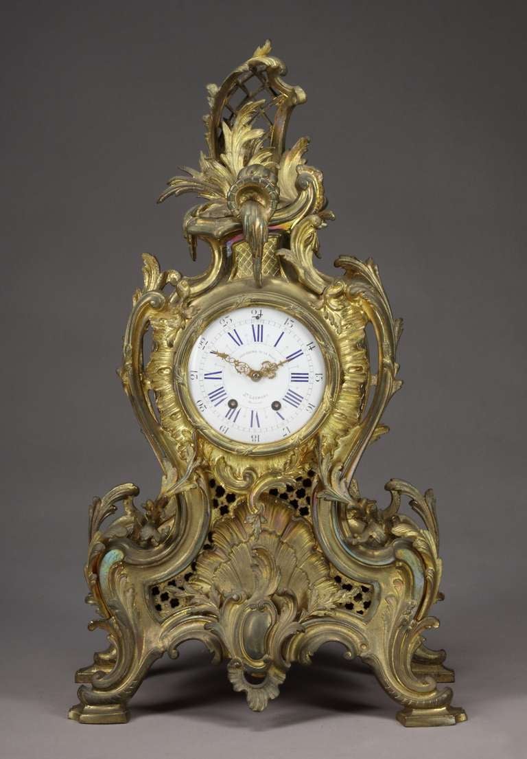 A 19th century Belgian gilt bronze Louis XV style mantel clock.

Dial Marked: Honiogerie De La Poste, d.h Leemans.

Dimensions: Height 29