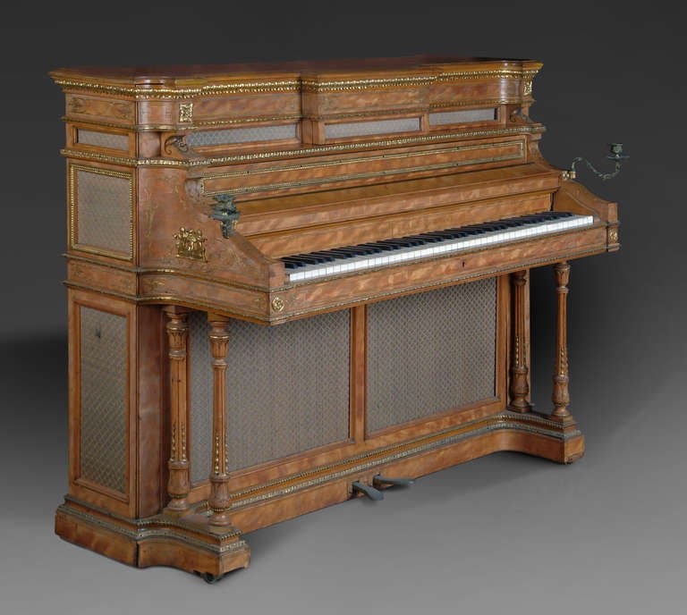 A Fine English Antique Bronze Mounted Erard Upright Piano 

London, Late 19th century.

The case Made by Leonard William Collmann
Leonard William Collmann was a very well known decorator who designed and manufactured furniture of excellent