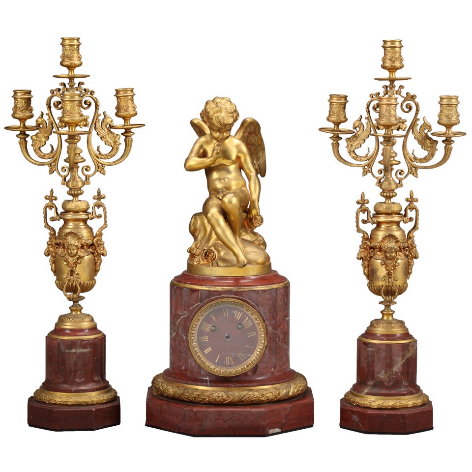 Antique French Gilt Bronze and Rouge Marble Clock Set For Sale