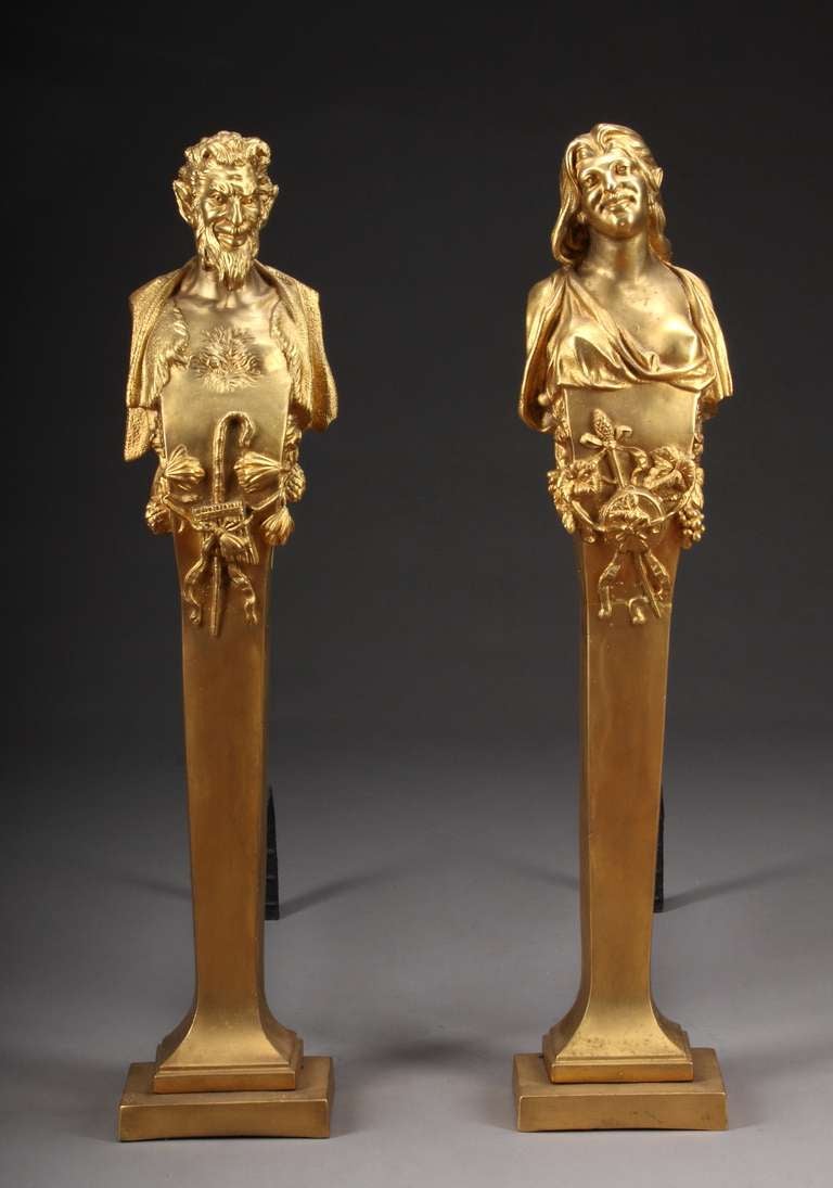 A pair of late 19th century gilt bronze fireplace figural bronze andirons designed by Ernest coxhead.
Depicting Pan & Nymph,
circa 1890

Measures: Height 32