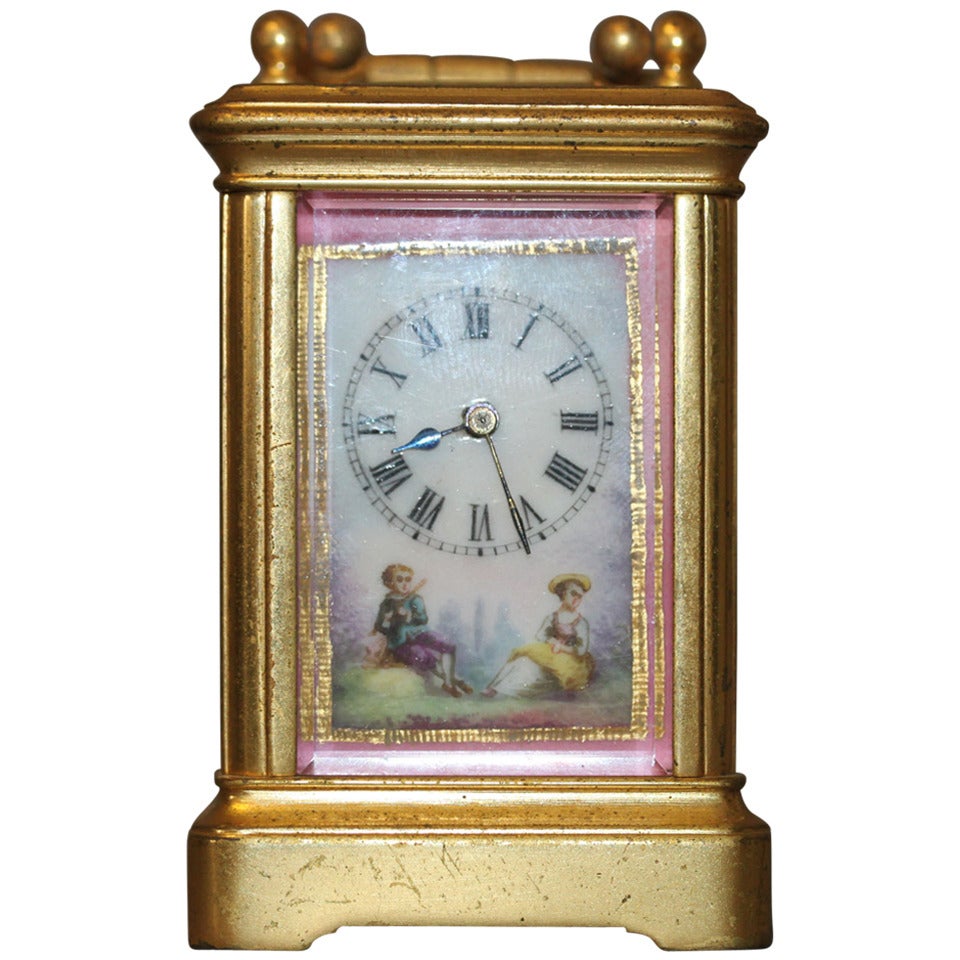 Horloge miniature française à chariot monté sur porcelaine