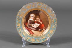 A 19th Century Royal Vienna Painted Deep Plate/Bowl of Two Children.