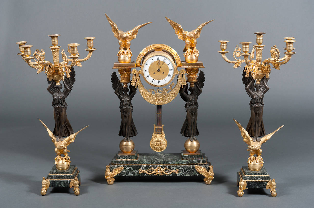 An Palatial 19th Century French Second Empire Ormolu Mounted Bronze and Green Marble Three Piece Garniture Set

circa 1820.

Origin: France

Measures: Clock
Height 32