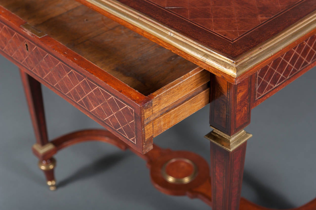 Late 19th Century A Pair of English Mahogany Side Tables with Gilt Brass Mounts & a Stretcher