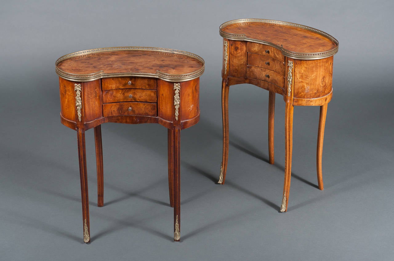 A Pair of French BrassMounted Kidney Shaped Side Tables with Drawers