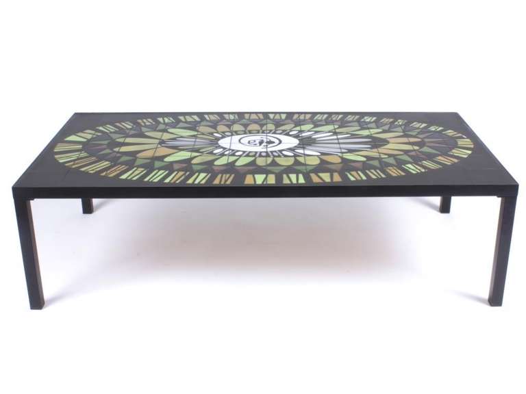 Ceramic table created by Roger Capron circa 1960.
Black lacquered metal, polychrome ceramic.
Signed 'R. Capron'