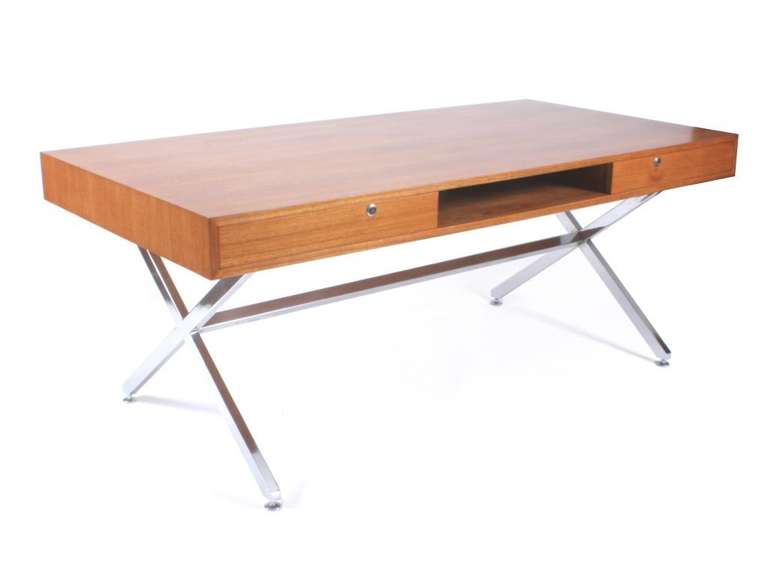 Desk model President designed by Pierre Guariche and edited by Les Huchers-Minvielle in 1962.
Chromed metal, white laminated, teak.