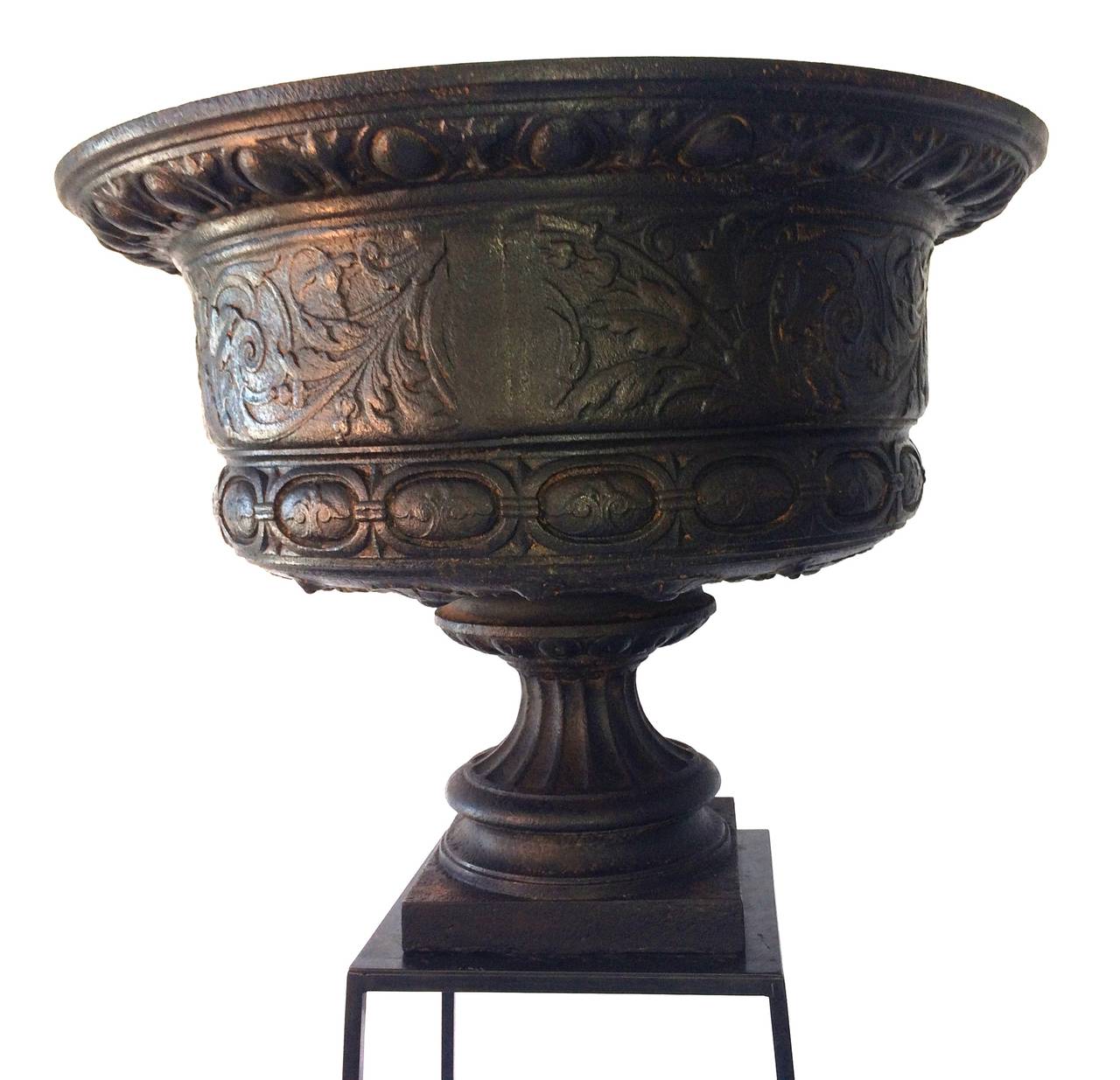 Most extraordinary pair of 1860s English cast iron urns with architectural stands. 
Cast iron urns: 28