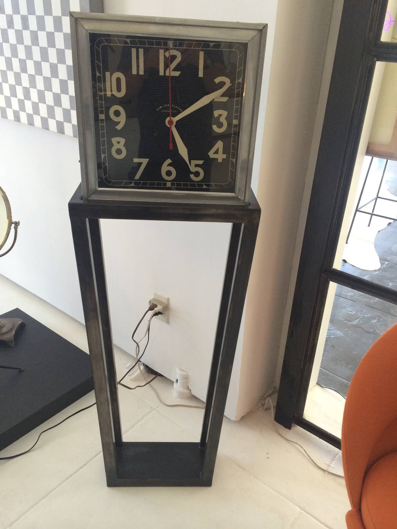 Most unique 1940s electric clock on architectural metal base.  Lumi-Dial Clocks, Chicago, ILL.