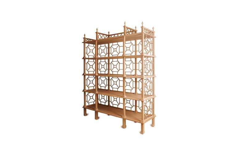 Outdoor etagere shown in bleached teak. Features hand-carved fretwork, balustrade top and finial details. Stiles terminate into ming style horse hoof feet. Suitable for indoor or outdoor use.

Dimensions: 78