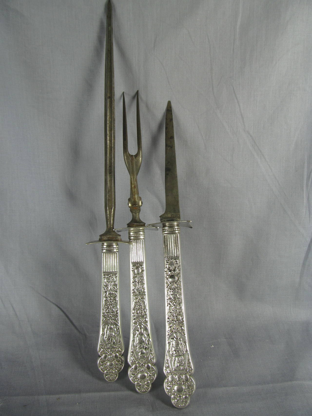 Three-piece carving set by Gorham. Old Medici pattern, discontinued in 1991. No monograms. Only hand polished.
