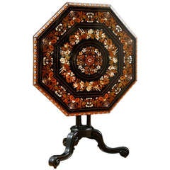 Octagonal Tilt-Top Table in Ebonized Wood with Inlays of Mother of Pearl and Various Woods, England circa 1840