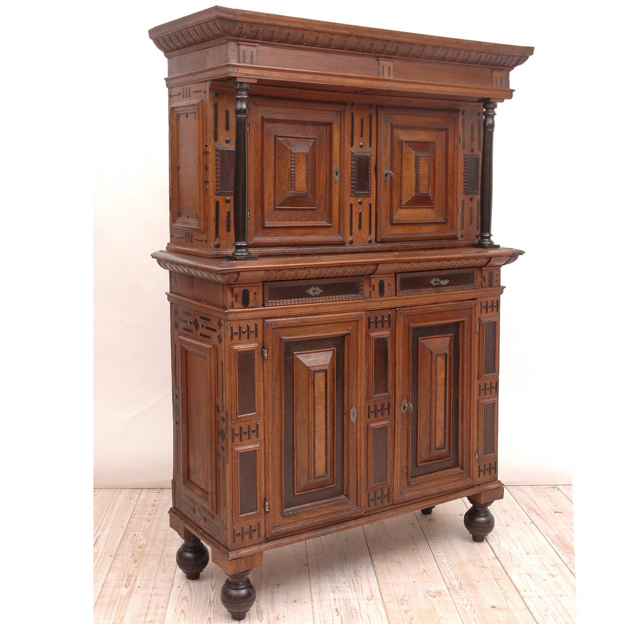 A Dutch Baroque cupboard in oak, rosewood, walnut and ebony with ebonized details, circa 1670. Original hinges and locks that are functioning with three original keys.
We have many more close-ups. Please request additional photos if you are