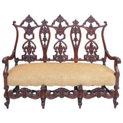 Gilded Age American Neo-Gothic Carved Settee in Mahogany, circa 1890