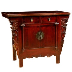 Chinese Qing Cinnabar Red Cabinet with Carved Peonies, circa 1800