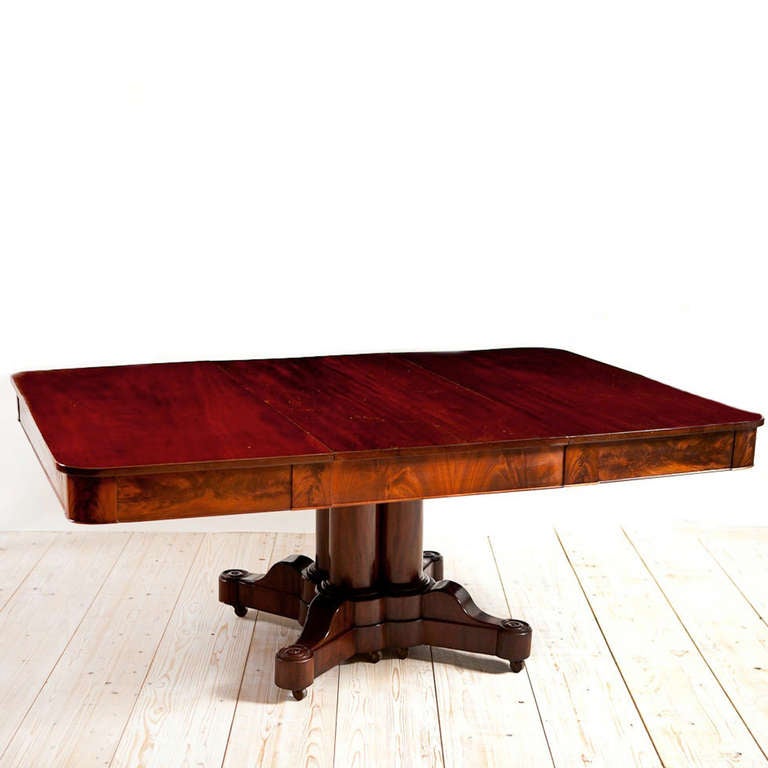 American Empire Cluster Base Dining Table in Mahogany with Leaf, Boston, c. 1830
Table is attributable to Boston cabinet maker Issac Vose.

Extension Table
50 1/2