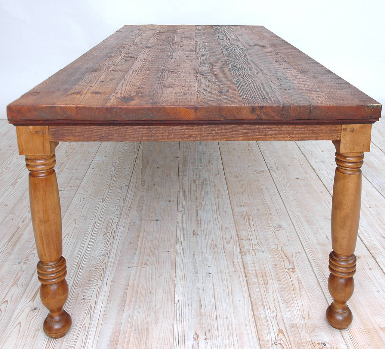 A beautifully crafted and finished eight foot long dining table in reclaimed pine timbers with thick plank top and turned legs. Tung oil finish. Seats 10.
Dining table as shown with west coast Ponderosa pine top and apron with turned legs in
