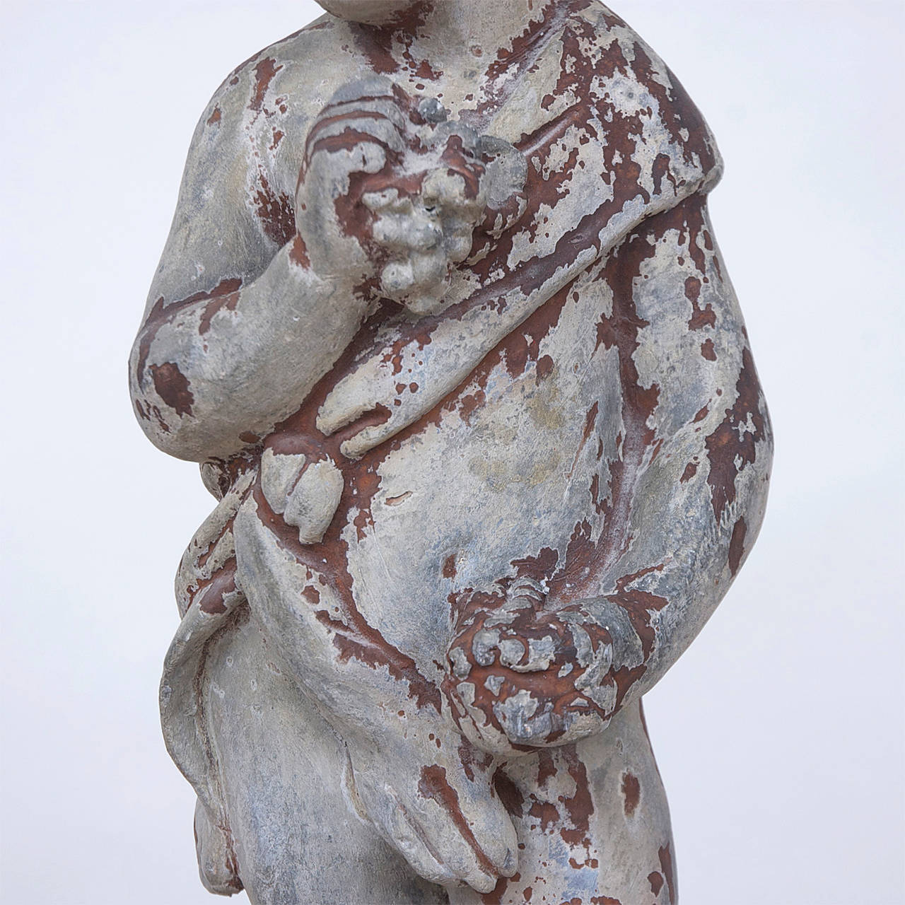 Classical Roman Cast Lead Garden Statue of Child Holding Grapes Representing 