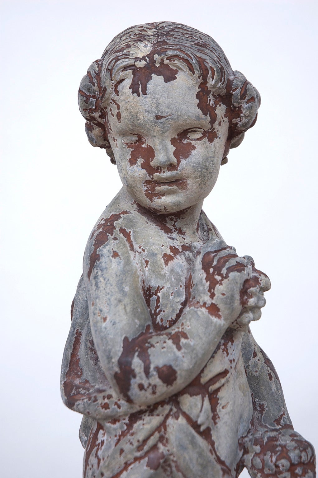 Cast Lead Garden Statue of Child Holding Grapes Representing 