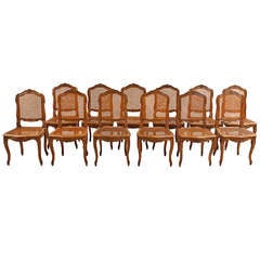 Set of 12 (Twelve) French Louis XV Style Caned Dining Chairs in Walnut, c. 1880