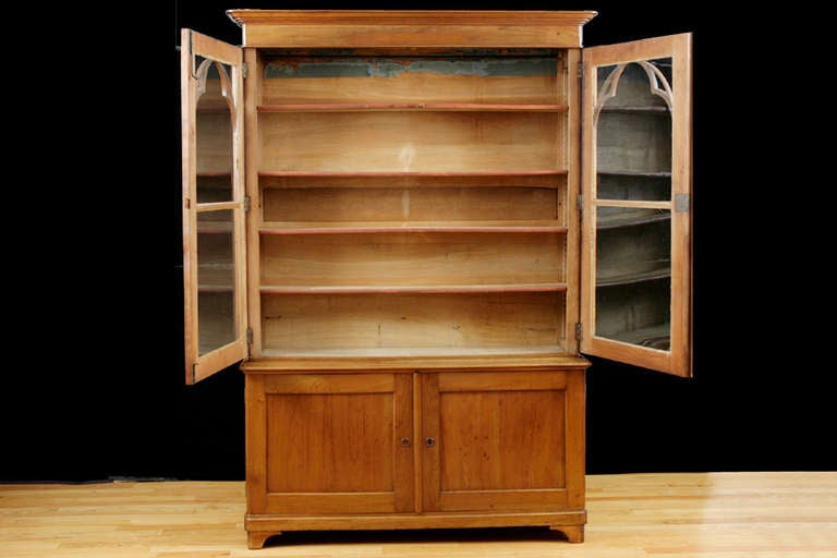 Early 19th Century French Charles X Bookcase in Cherry Wood w/ Original Glass Door Panels, c. 1820 For Sale