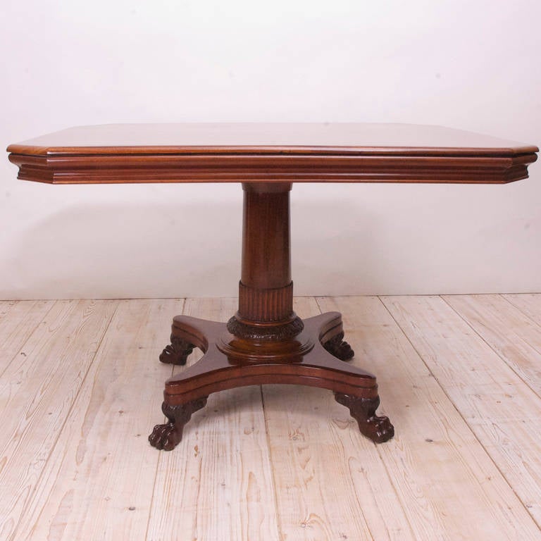 Danish Empire Rectangular Center Pedestal Table in Mahogany, circa 1830. This beautiful and well crafted Danish Empire Salon Table is from the reign of Christian VIII. The well articulated carvings, the dense rich mahogany from the West Indies and