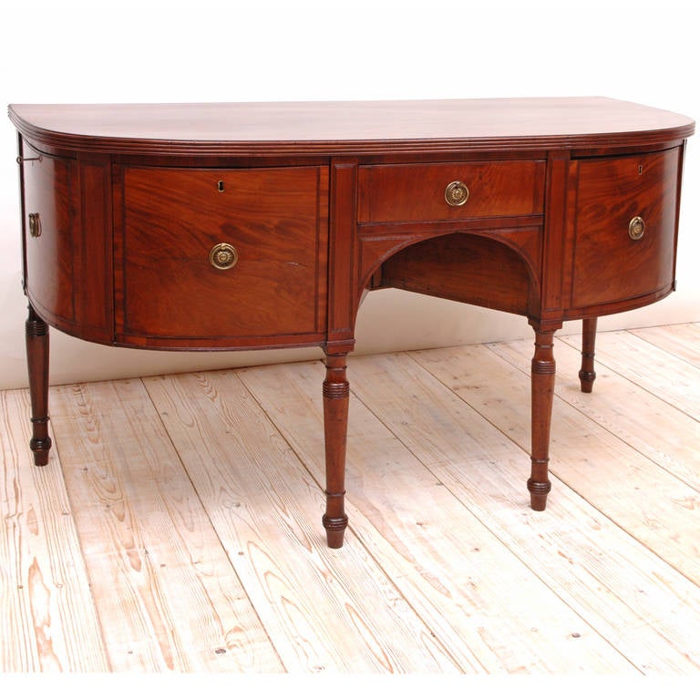 An English George III sideboard just over 5' long in mahogany in 