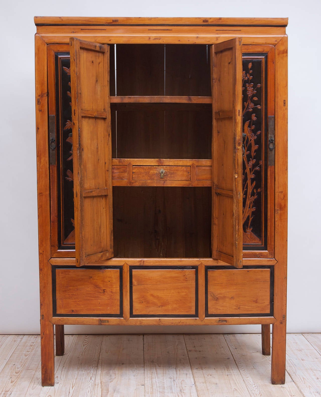 Antique Chinese Cabinet in Elm with Carved Scenes of Four Seasons & Ebonizing In Good Condition For Sale In Miami, FL