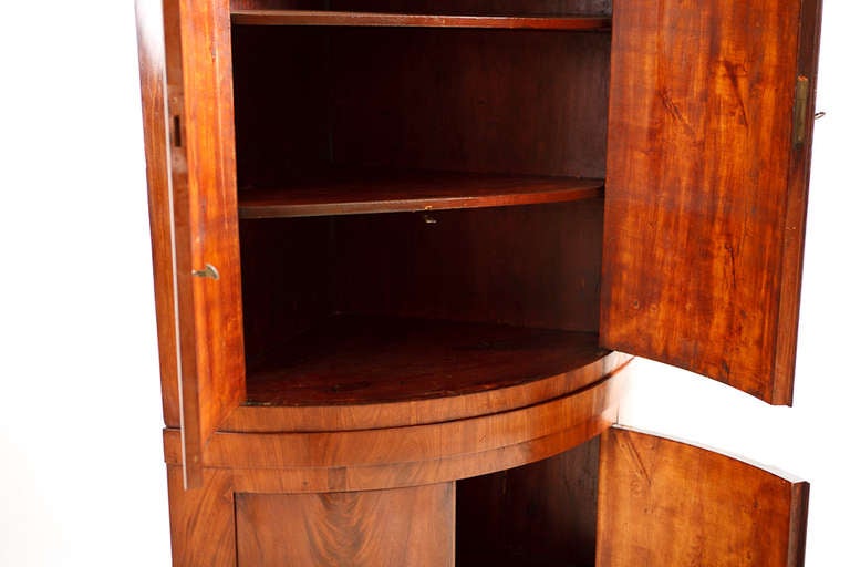 Polished Bow Front Danish Empire Corner Cabinet or Cupboard in Mahogany, circa 1810