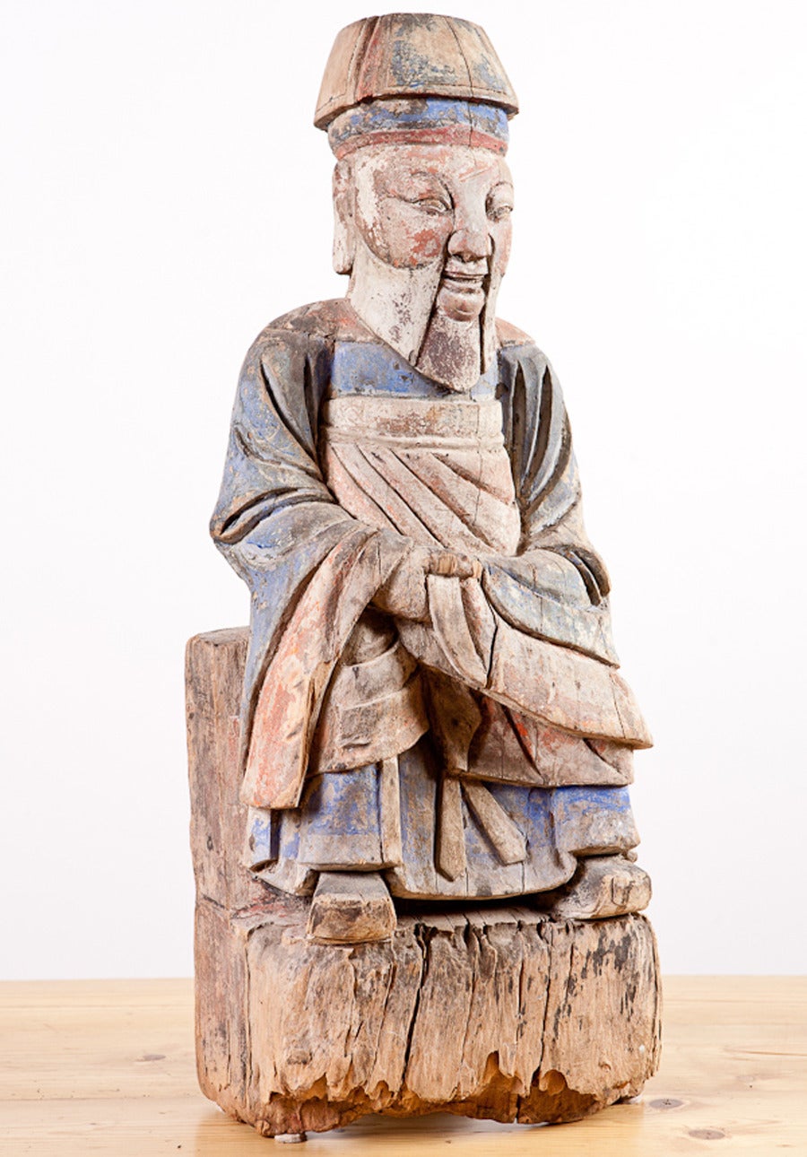 Chinese ancestral sculpture in wood with original faded polychrome finish, circa 1750.
Measures: 11 1/2