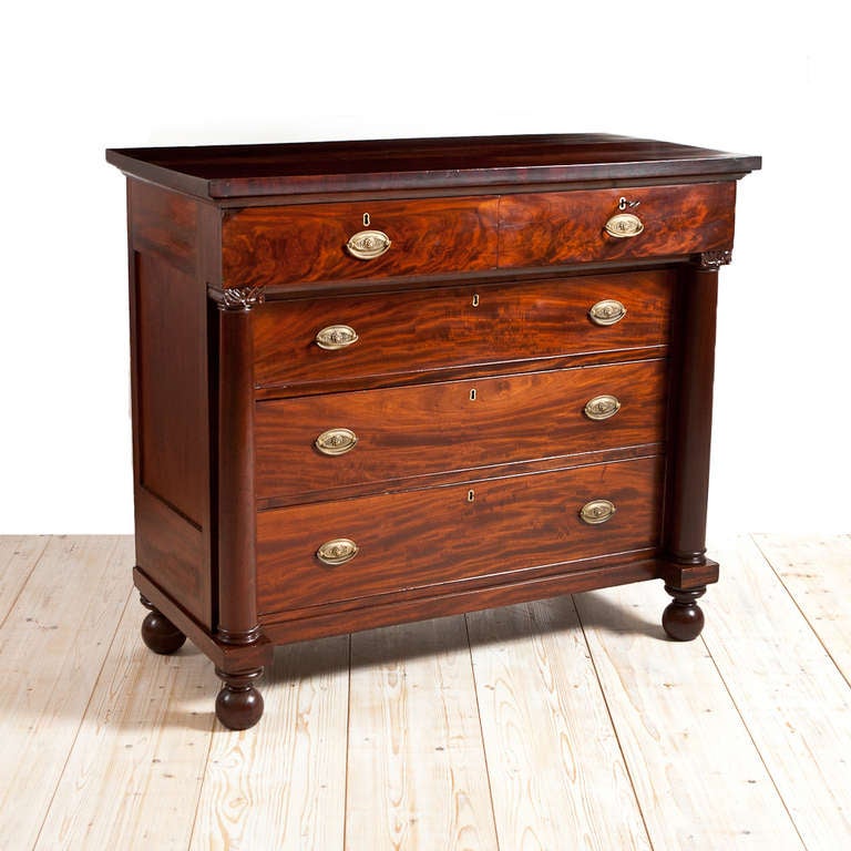  Beautiful two over three full column chest with exceptional crotch mahogany veneer. Philadelphia, circa 1815. Chest of drawers has been restored. We replaced and repaired missing or damaged veneers. Re-glued all loose joints, made drawers operable