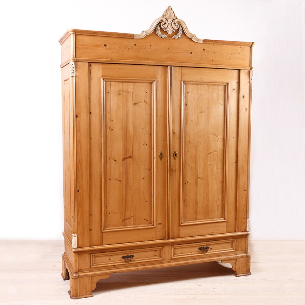 Massive North German Pine Armoire with Gesso Appliques on the Bonnet, circa 1850