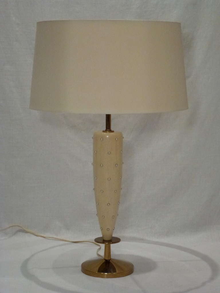 Graceful Bleached Mohogany Table Lamp with Pearlized Studs and Brass Base by Rembrandt.  Shade Included.