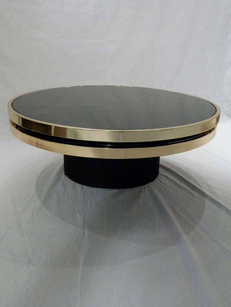 Late 20th Century Italian Modern Brass and Glass Swivel Table