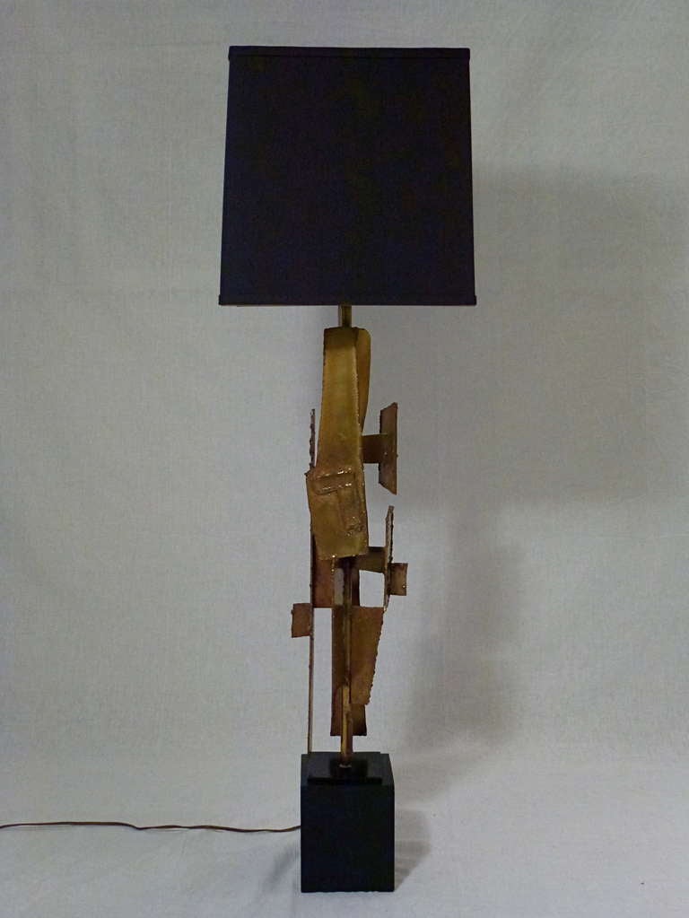 Brutalist Welded Torch Cut Steel Lamp Designed by Harry Balmer for the Laurel Lamp Company.  A Sculptural Piece in a Rare Original Bronze Finish with a Beautiful Patina. Shade Included.
1960s