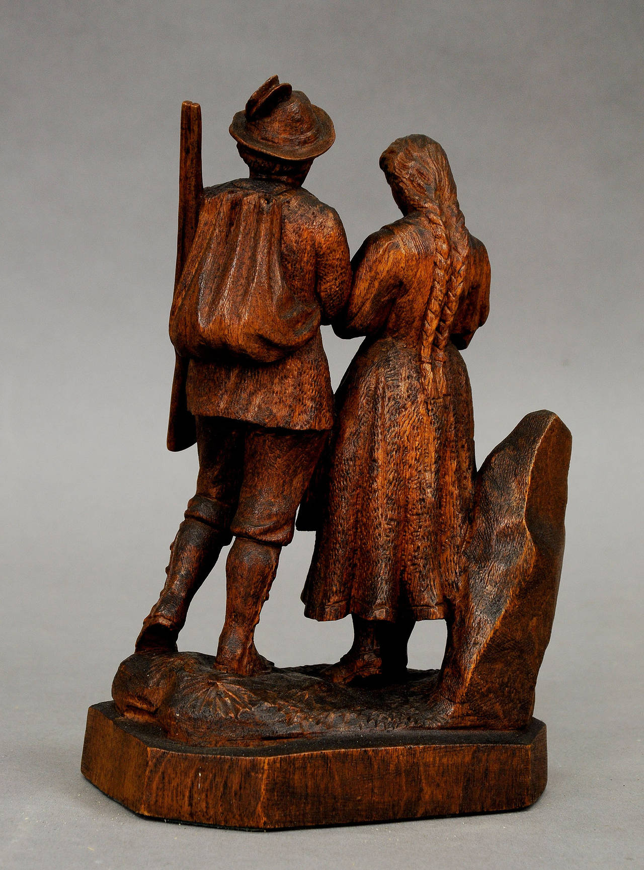19th Century Great Carved Wood Hunter with Maid, Swiss Brienz