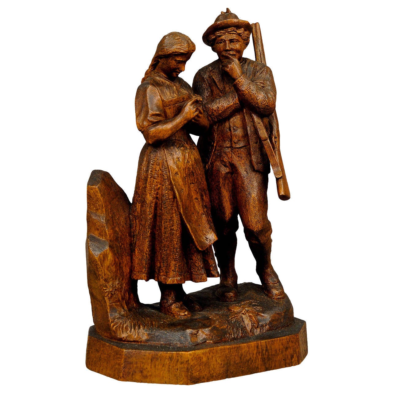 Great Carved Wood Hunter with Maid, Swiss Brienz at 1stDibs