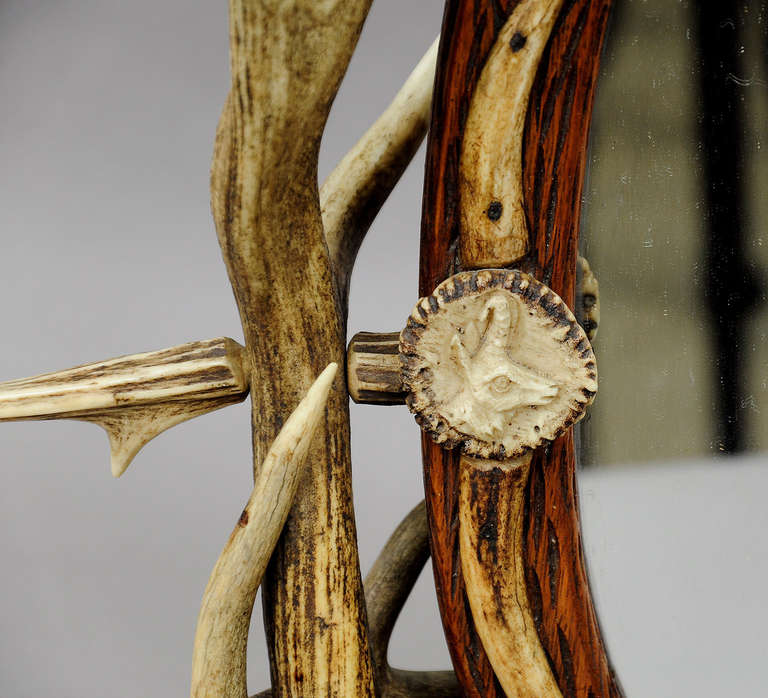 20th Century Antique Carved Wood Vanity Mirror with Antler Decorations